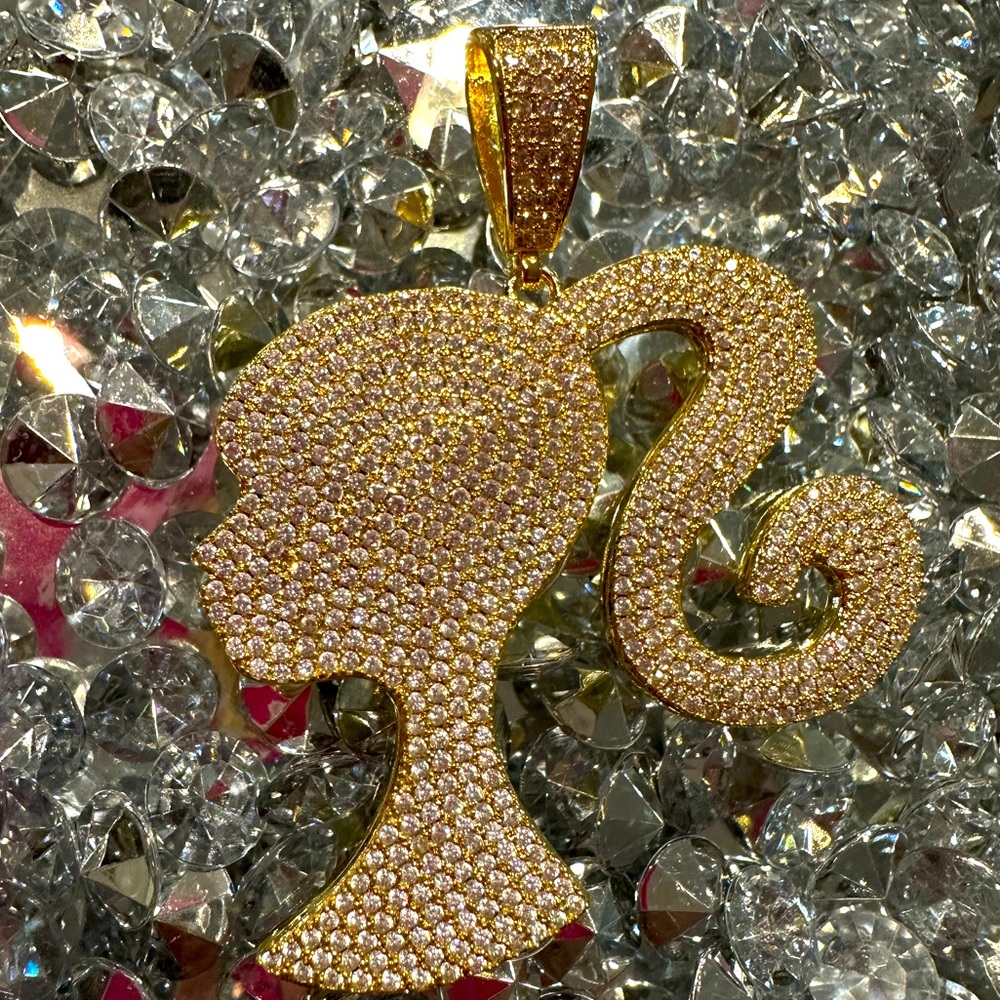 Blinged out Barbie pendant. Gold